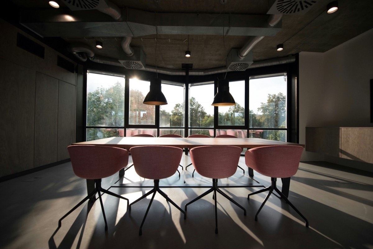 Empty boardroom with natural light, representing executive coaching