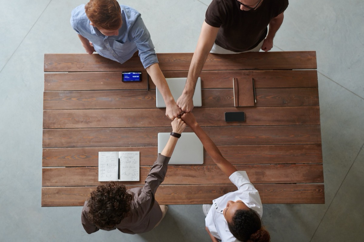 Colleagues connecting in conversation, representing communication training